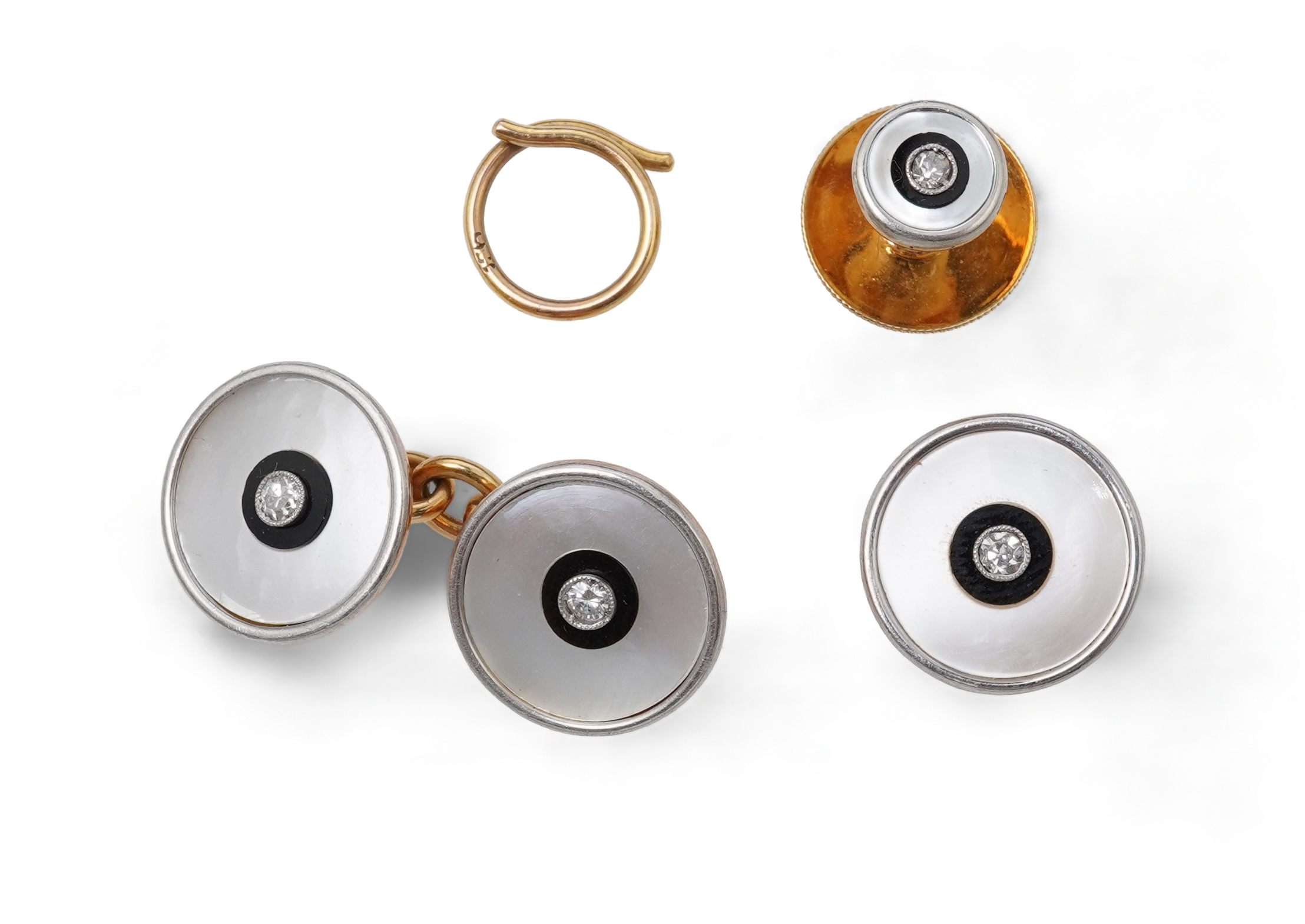 An Art Deco mother of pearl, onyx and diamond dress set, early 20th century